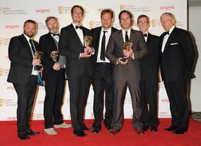 The Factual Series BAFTA went to the team behind Our War. They're pictured here with Apprentice and Countdown star Nick Hewer.