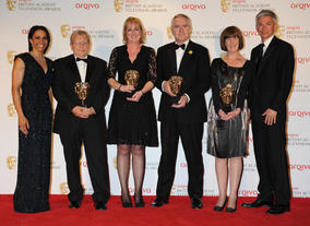The Sport and Live Event BAFTA went to the team behind coverage of The Royal Wedding, including presenter Huw Edwards. They're pictured here alongside athletes Dame Kelly Holmes and Jonathan Edwards.