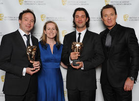 Presenter Martin Kemp with the Trapped winners, including Rob Hyde and James Morgan.