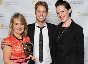 Presenter Sam Branson with the winners of Disney Channel animation Fish Hooks.
