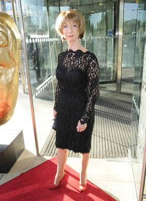 Actress Helen Worth arrives at the Awards to join in the celebrations with the Coronation Street team. 