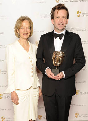 Director Philip Martin celebrates his BAFTA win for Mo with award presenter Jenny Seagrove.