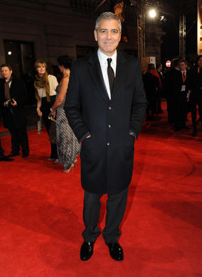 The filmmaker and actor is nominated for two awards: Leading Actor in The Descendants and Adapted Screenplay for The Ides of March. Clooney is wearing Armani.