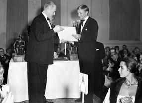 Jack Warner and Hardy Kruger at an Academy event in the Savoy Hotel, March 1959.