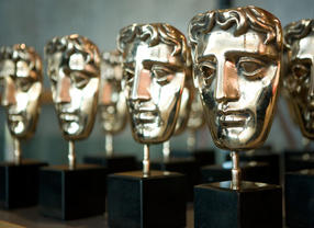 BAFTA masks wait to be presented at the British Academy Television Awards.