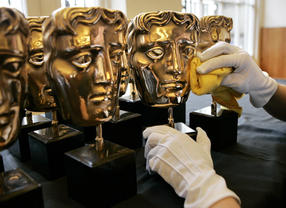 BAFTA masks are polished before the British Academy Television Awards.
