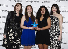 BAFTA CEO Amanda Berry and actress Gemma Arterton pose with the First Light Open Access Award winners in 2010.