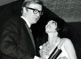 Michael Caine and Leslie Caron at the Film awards in 1965.