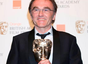 Danny Boyle celebrates his Director BAFTA for Slumdog Millionaire before the film also picked up the Best Film Award in 2009.