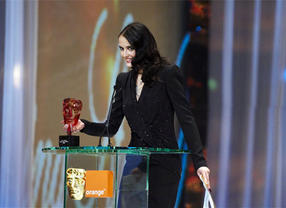 Orange Rising Star winner in 2007 Eva Green presents the award in 2008 at the Orange British Academy Film Awards in 2008.