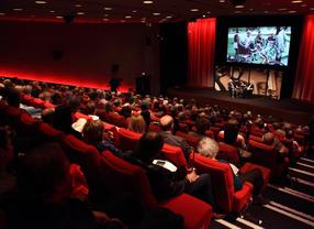 A captivated audience listens to tales from the British cinema legend. 