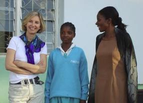 The Rosemary Pencil Foundation President Gillian Rose in Malawi with Gloria, a student at the New Era School for Girls, and Gladys Msonda from Children in the Wilderness.