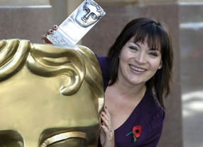 TV presenter Lorraine Kelly with her BAFTA Scotland award 