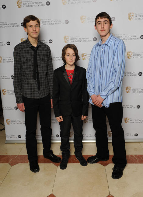 BAFTA Young Game Designers nominated team Hexadecimal pose for the cameras at the EA British Academy Children's Awards. Photography: BAFTA/ Richard Kendall